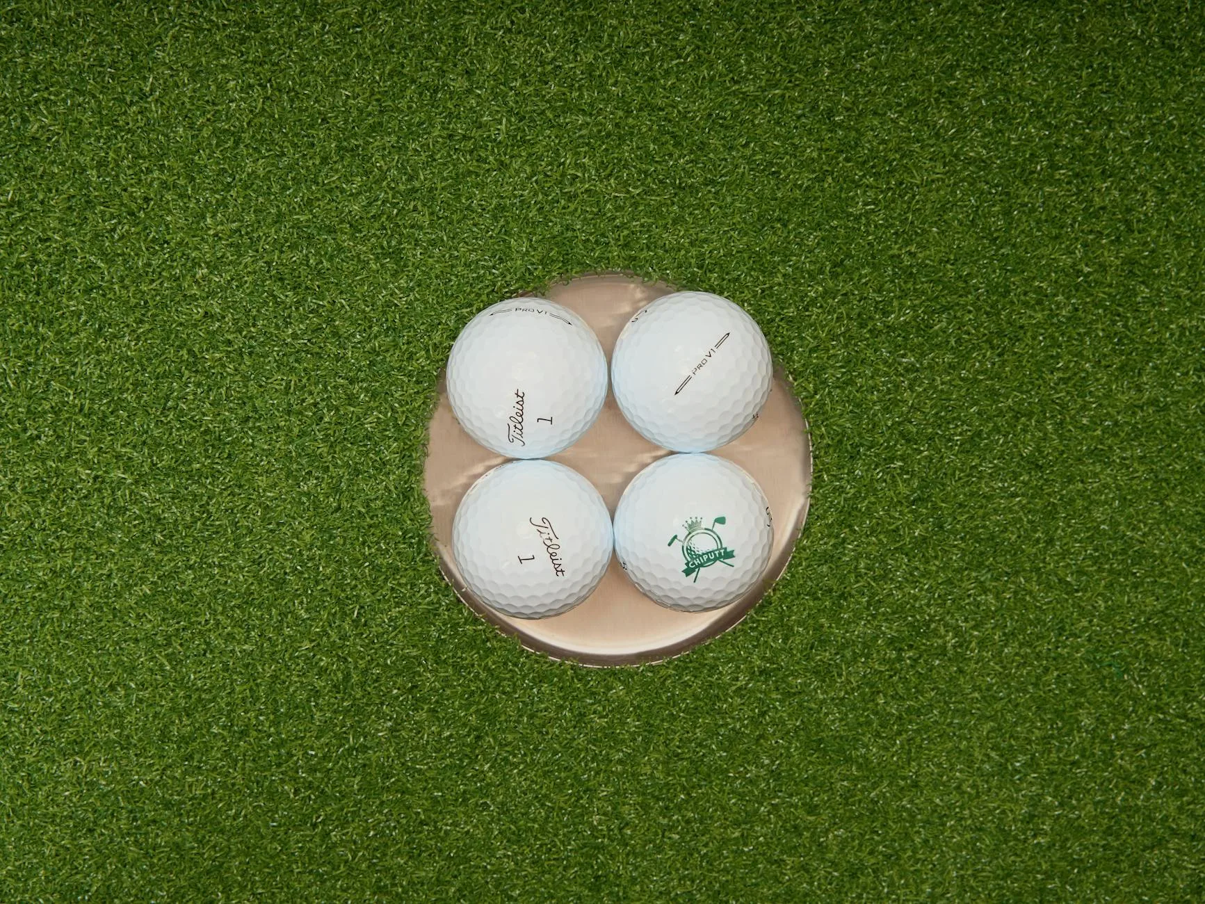 Multiple golf balls showing different types