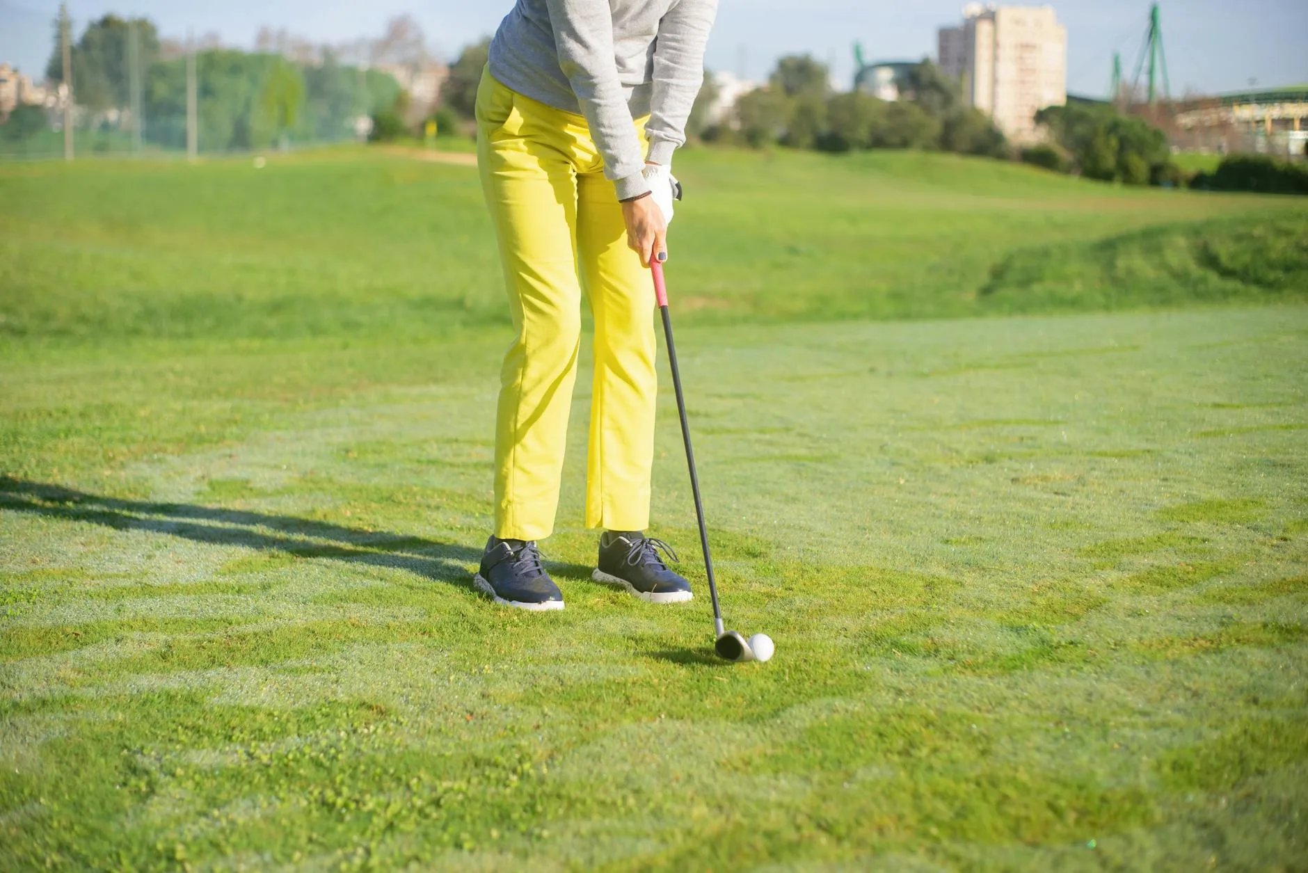 Golf club iron at impact position with ball