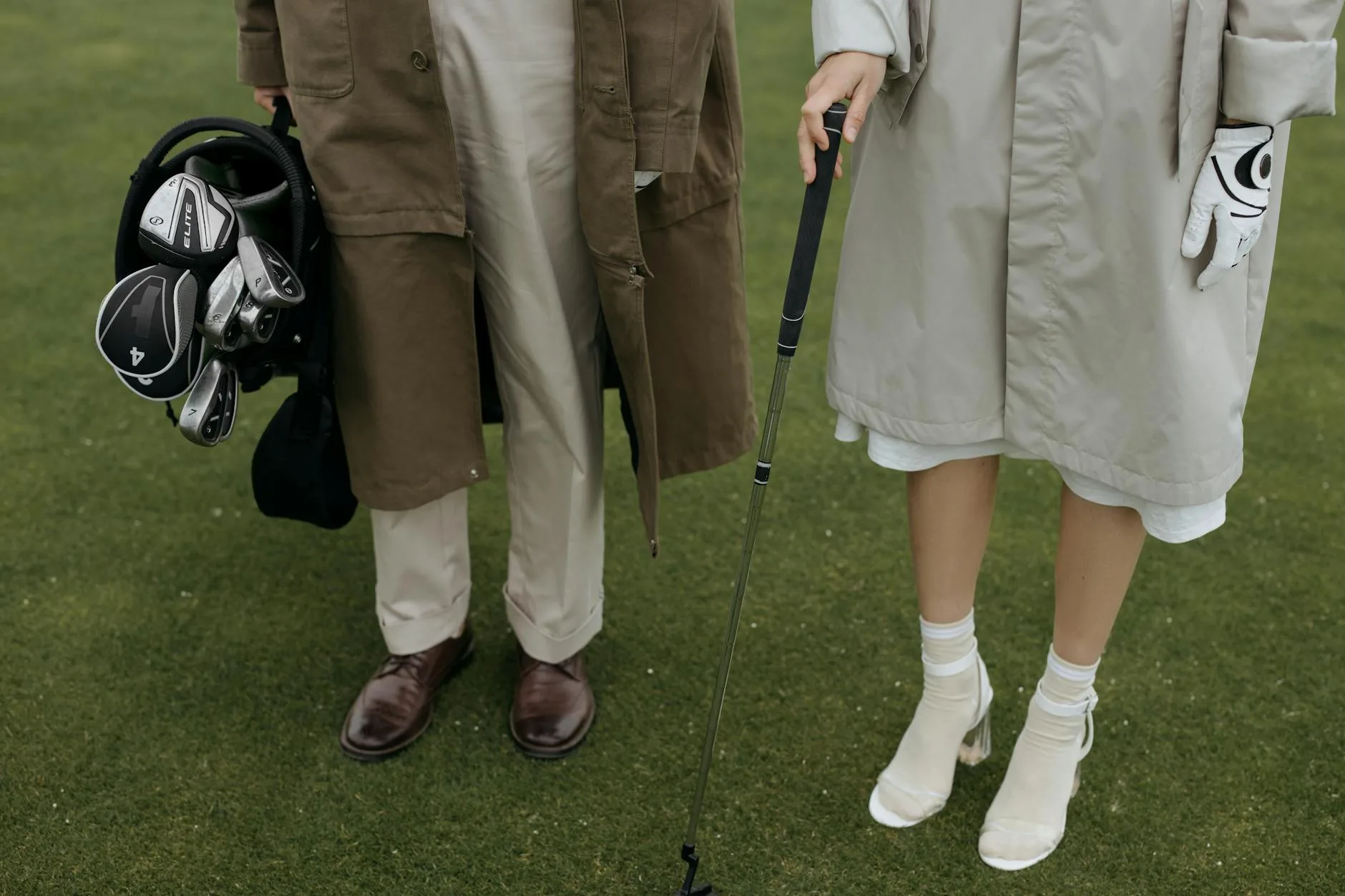 Golf clubs with head covers arranged in a golf bag
