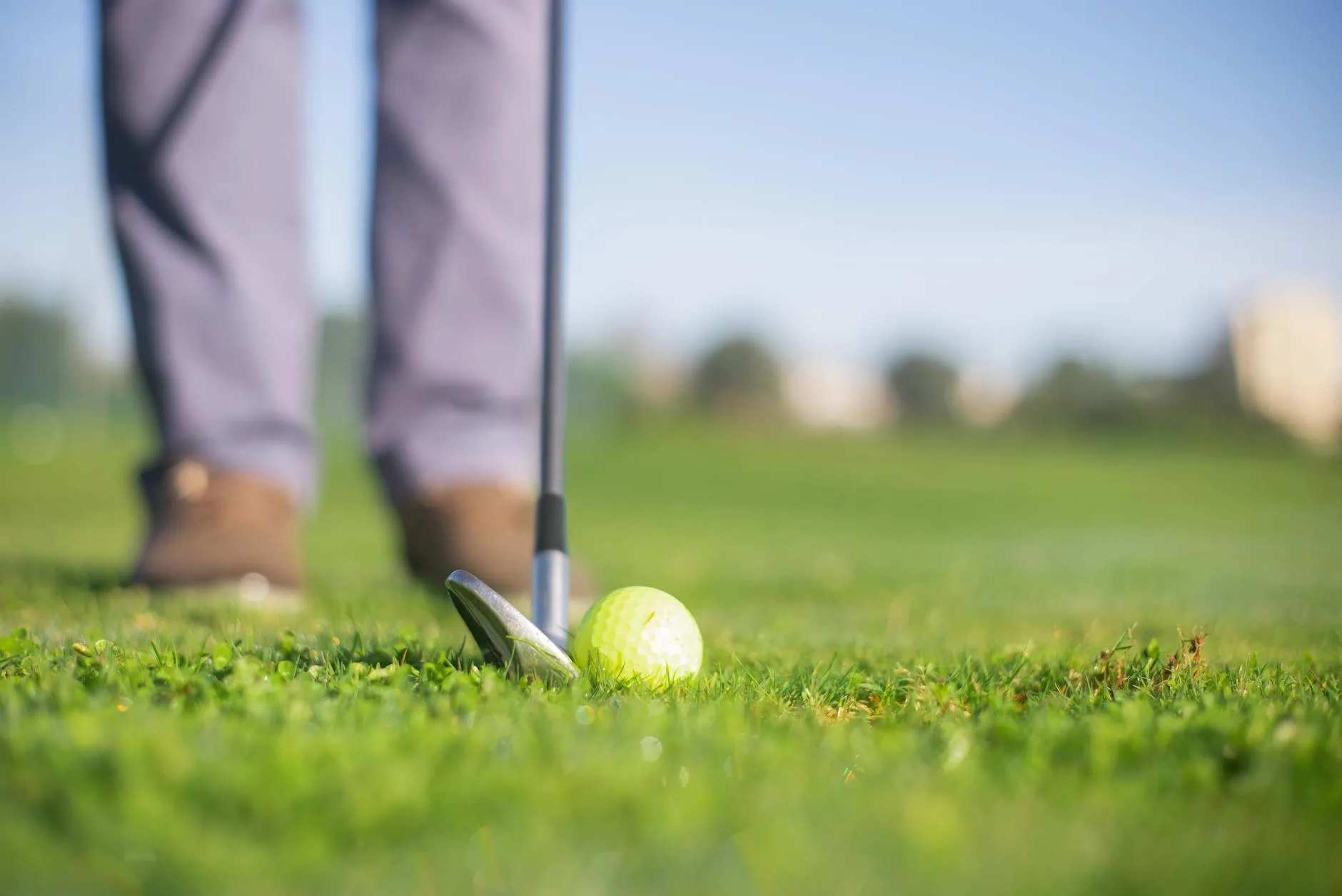 Close-up of a golf iron approach shot from the fairway