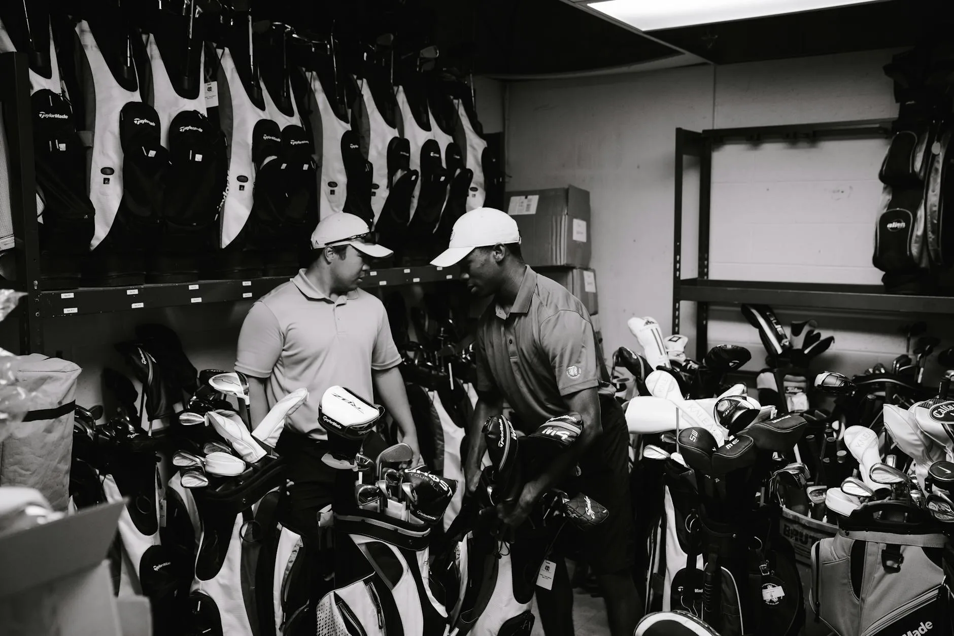 Starter set of golf clubs in a stand bag on grass
