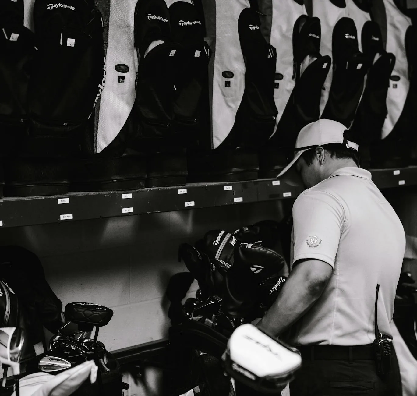Golf umbrella secured to a trolley alongside golf bag and gear