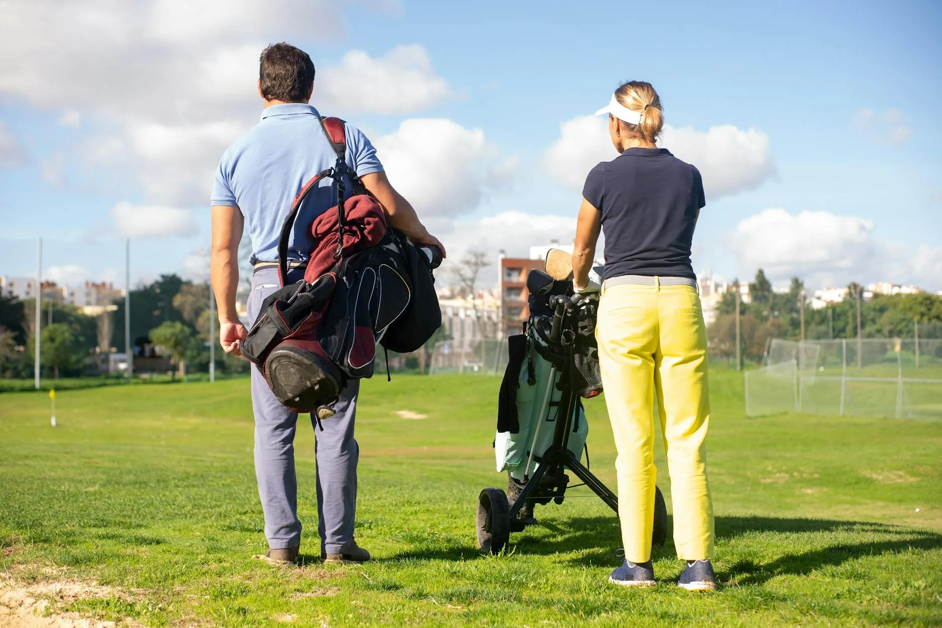 Golfer walking with a carry stand bag on the course