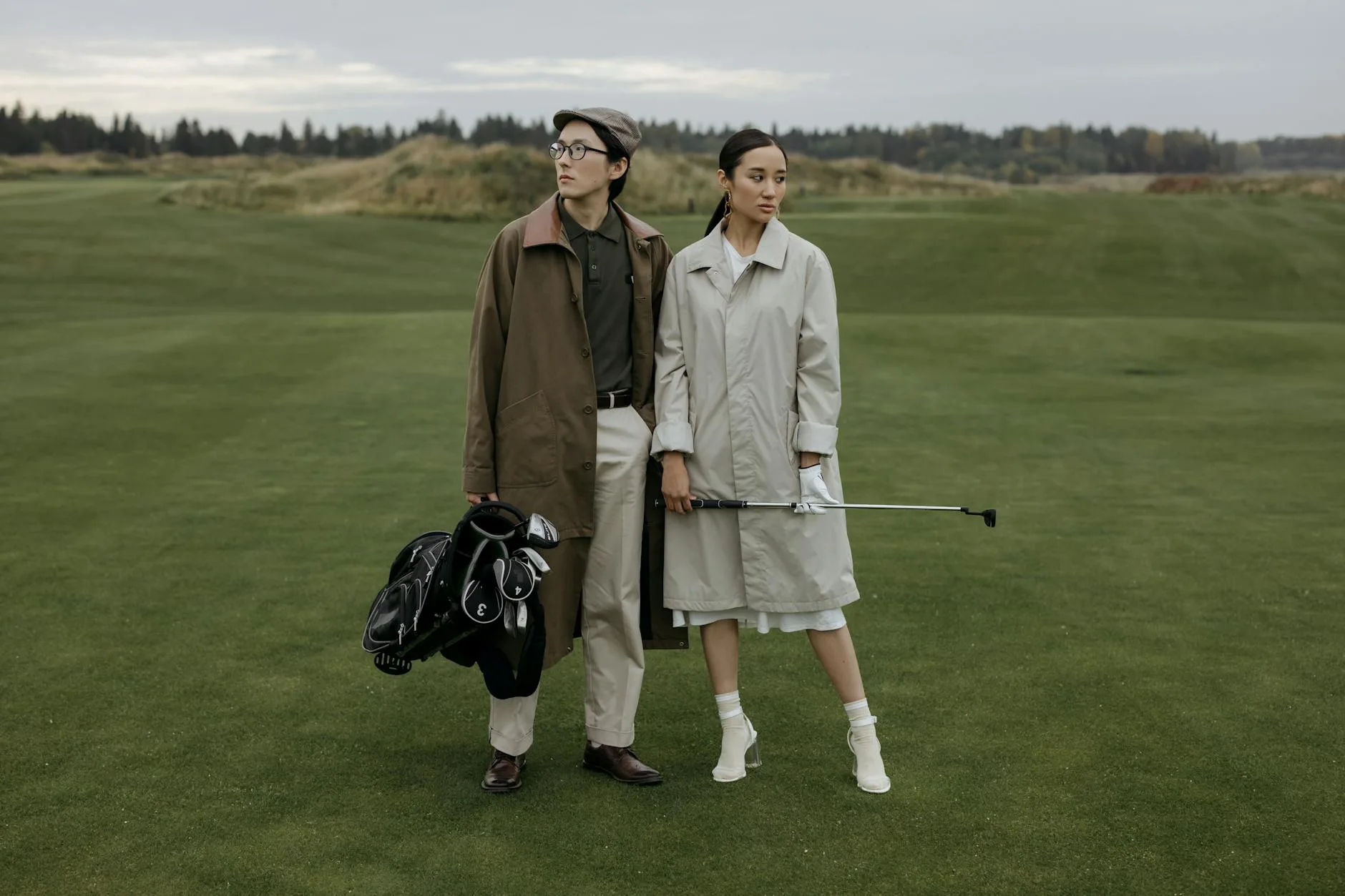 Set of golf clubs in a bag showing irons and wedges