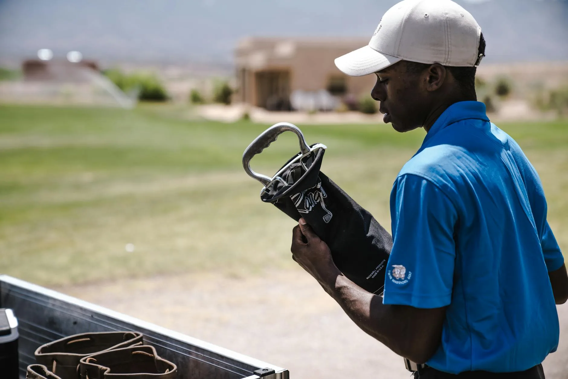 Golf bag with clubs and accessories on the course